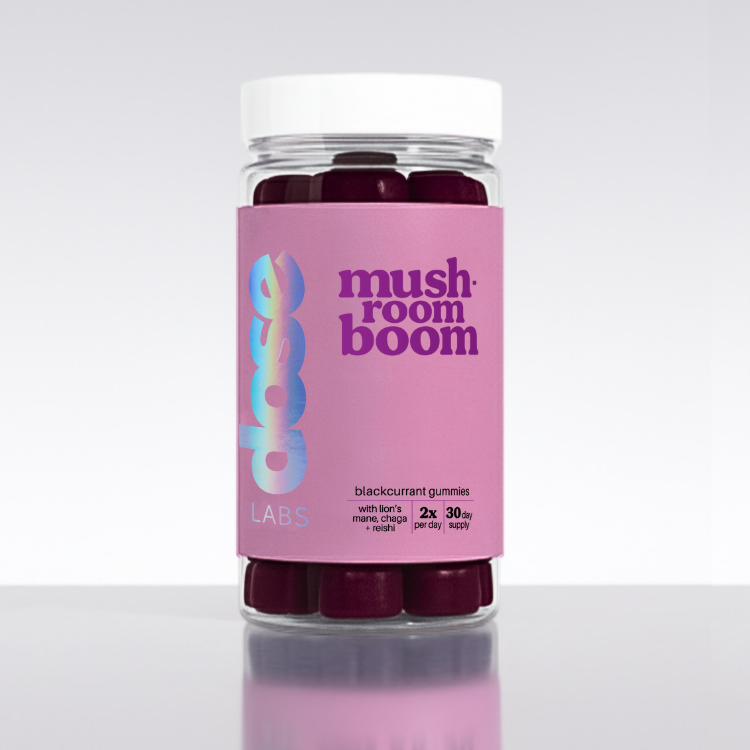 Supplement container with pink label on a white background