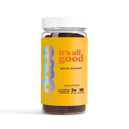 Jar of apple gummies with a colorful label on a white background