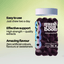 Mushroom Boom supplement bottle with text on a light green background