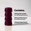 Stack of purple capsules with text about ingredients on a white background