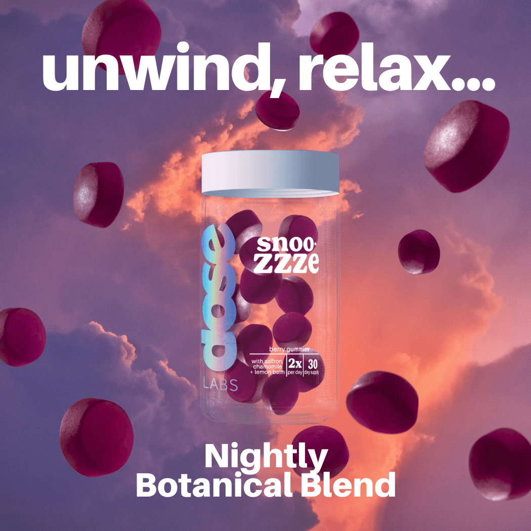 Bottle of snoozezze nightly botanical blend with purple gummies against a colorful sky background.